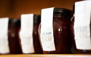 Row of homemade jam in jars to be sold