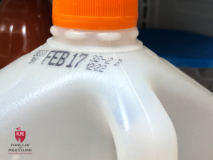 Bottle of milk showing best by date.